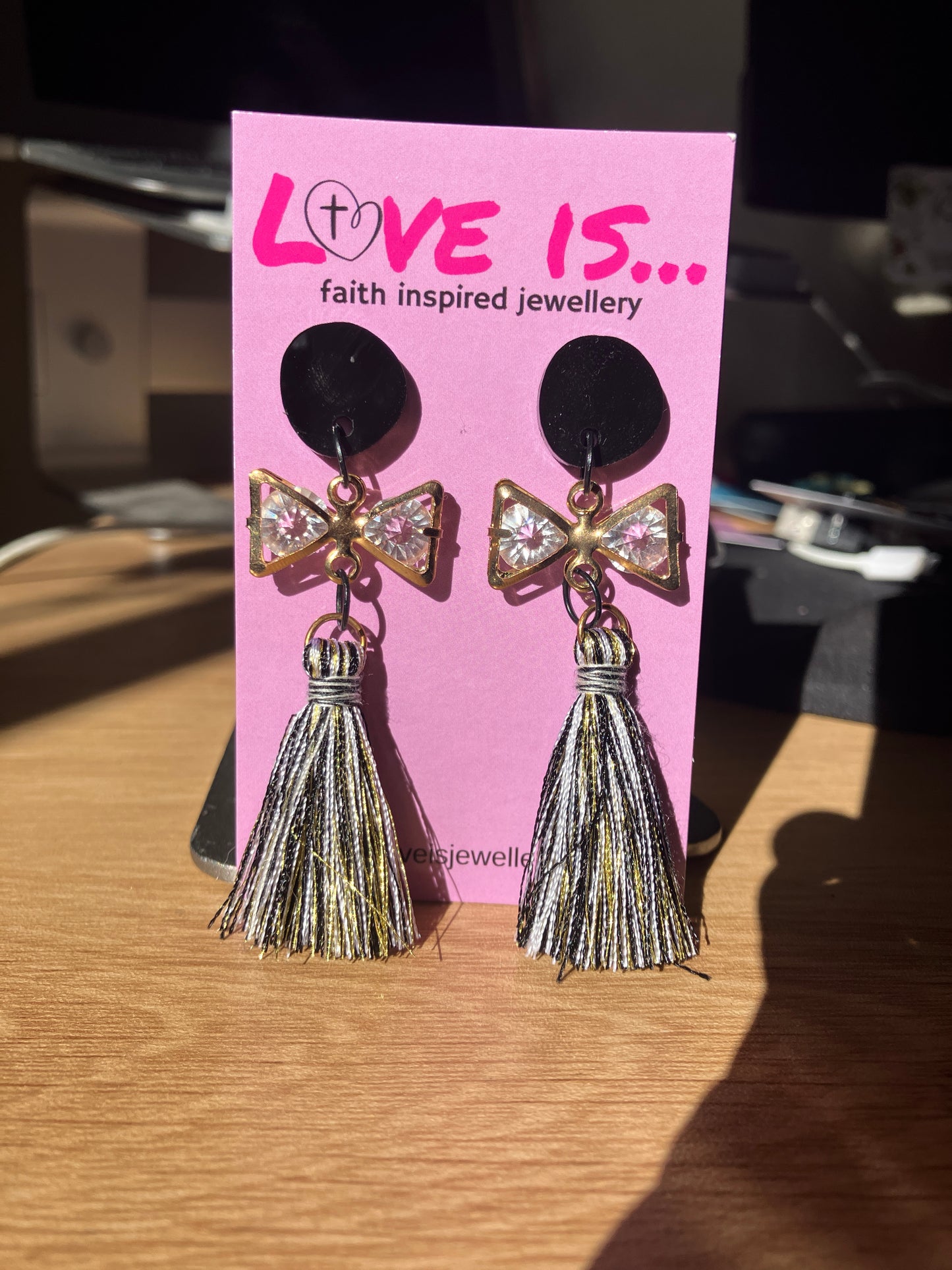 Clothed - bow and tassel