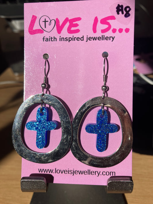 Sparkle - blue sparkly cross with metal oval frame